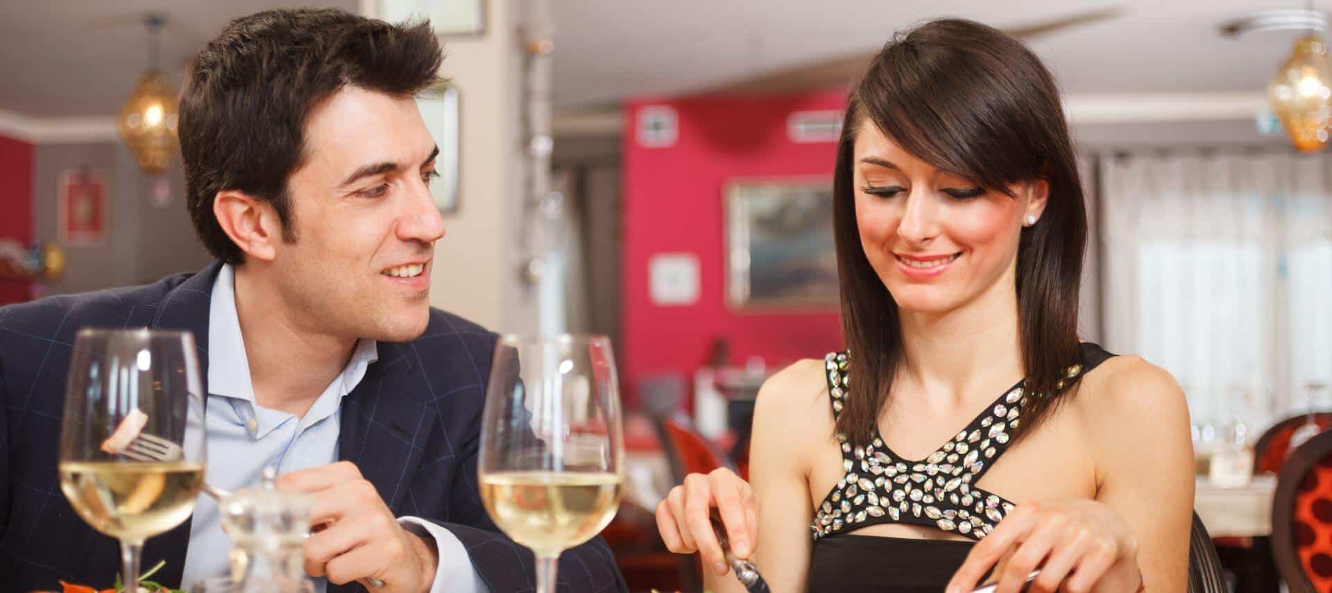 couple dining with wine at a restaurant